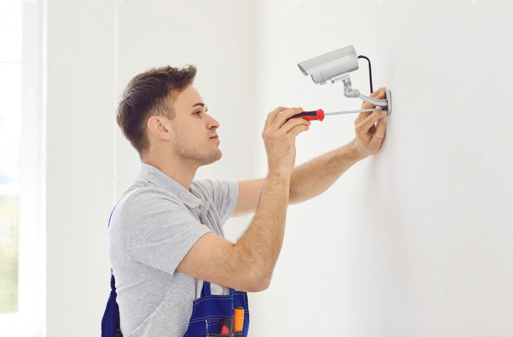 CCTV Maintenance Professional Installing Security Camera